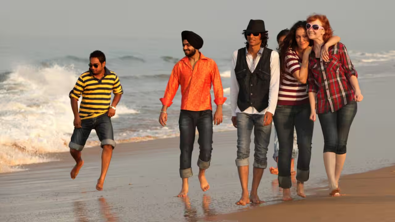Students enjoying an Australian beach near a city